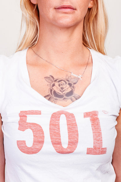 Three black rose temporary tattoos on a person's shoulders and chest