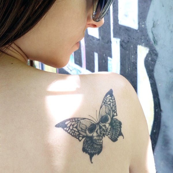 skull butterfly tattoos