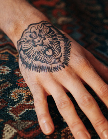 Tiger wrist tattoo by Bradley Conradie | Tiger tattoo, Tattoo designs, Tiger  tattoo images